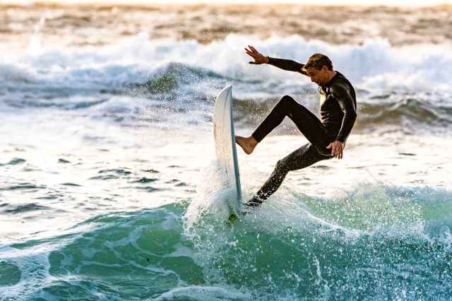 surfer performing tricks
